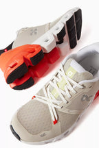 On running cloud flyer 4 beige orange black